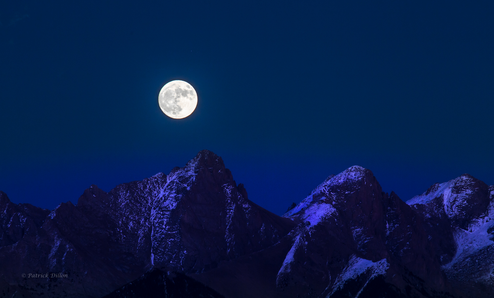 super moon rising above the needles san jaun mt